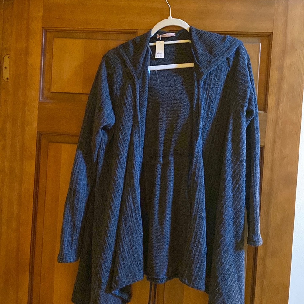 We with tags cardigan.